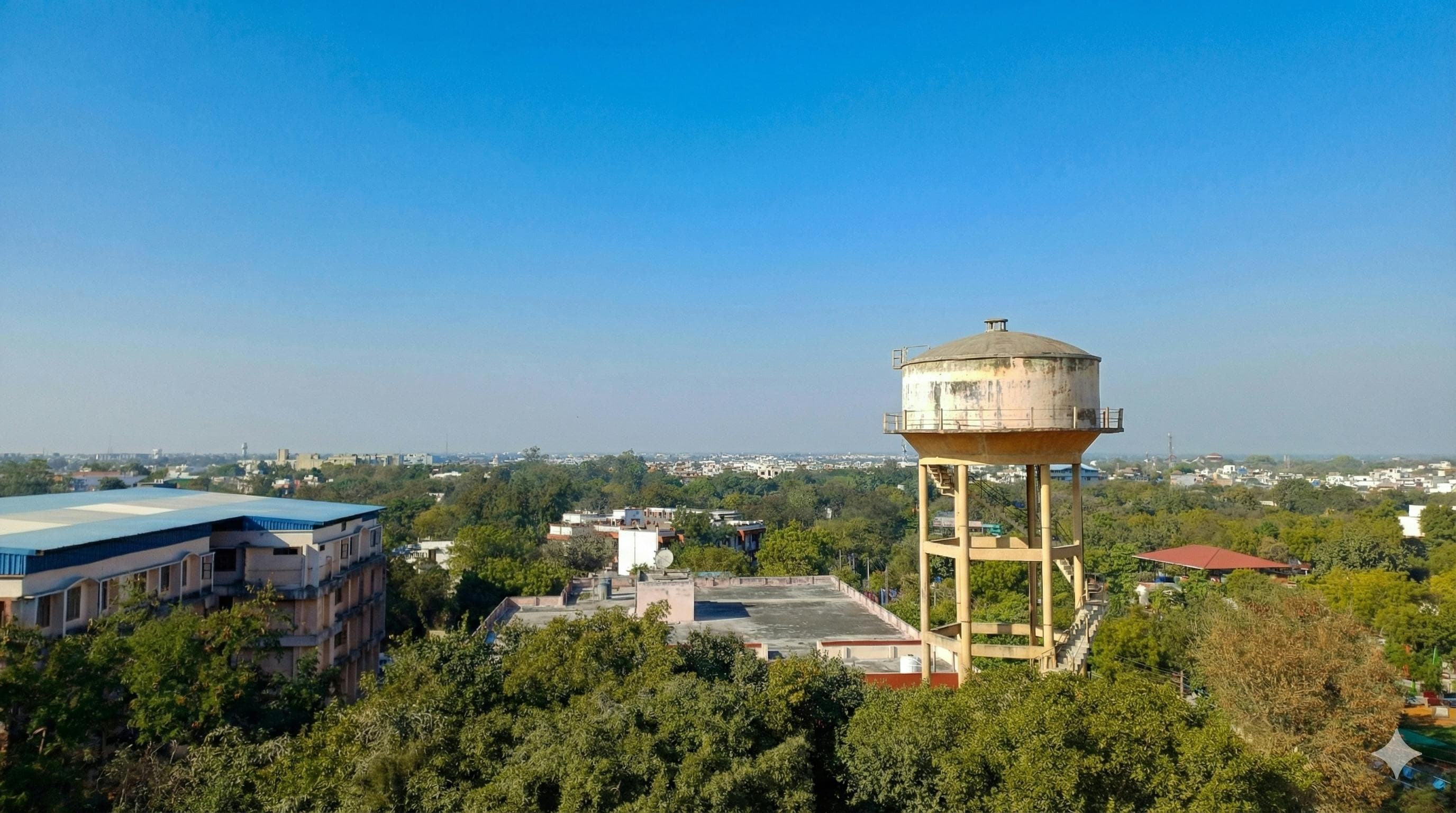 Clear blue sky over green town — strengthening air quality monitoring across Uttar Pradesh